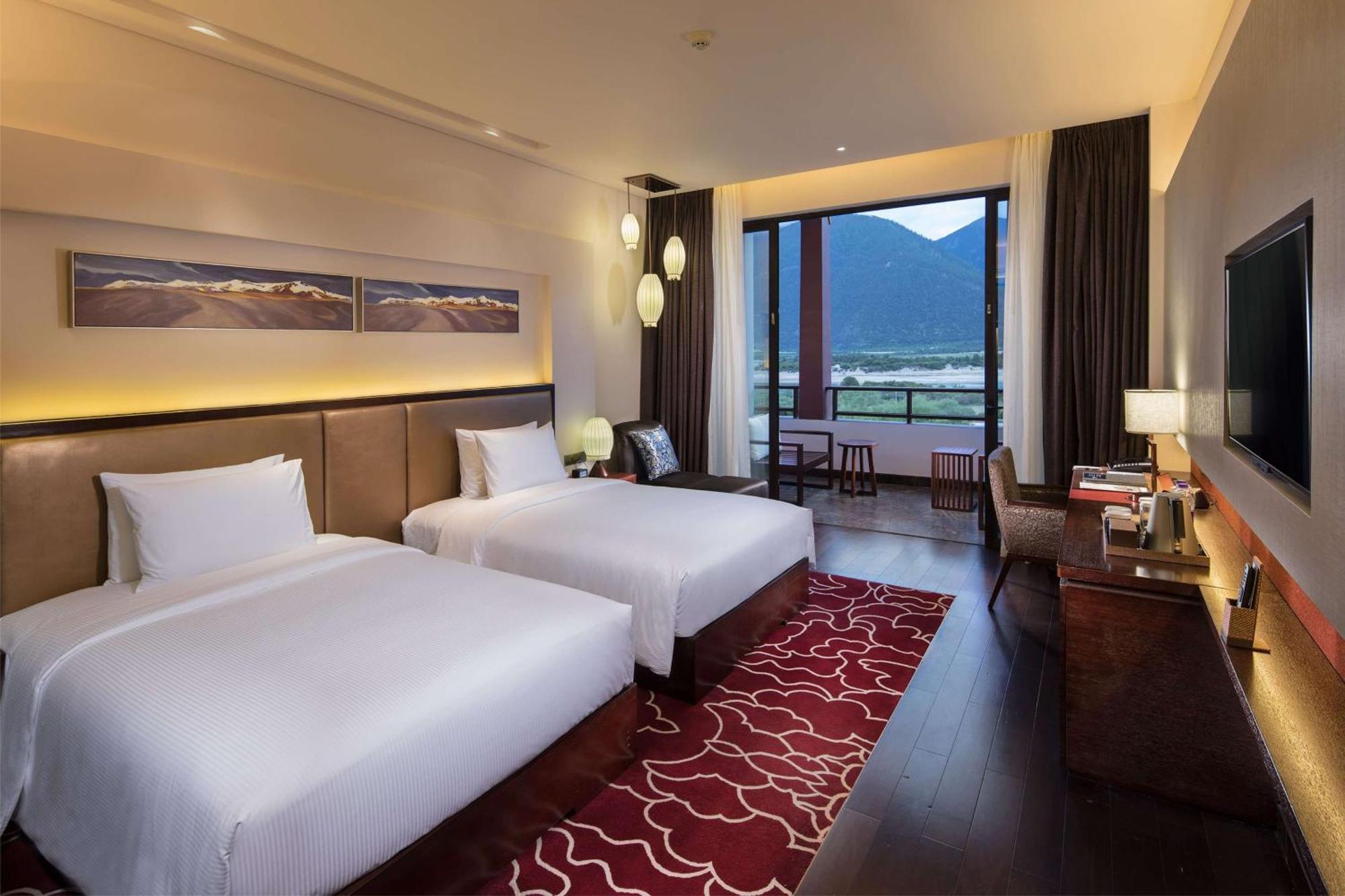 Hilton Linzhi Resort Ньингчи Экстерьер фото